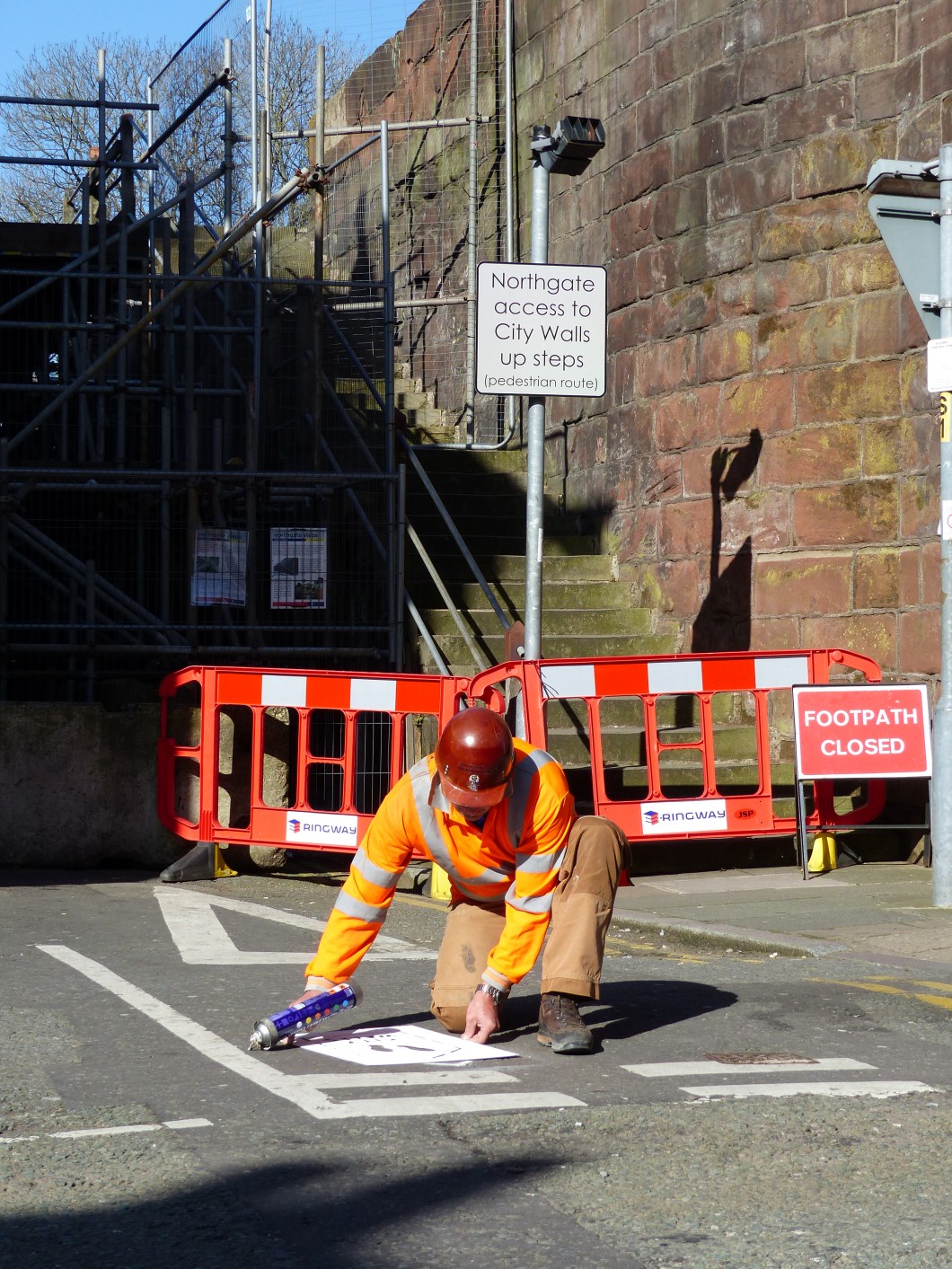 Ringway contractor applying stencil